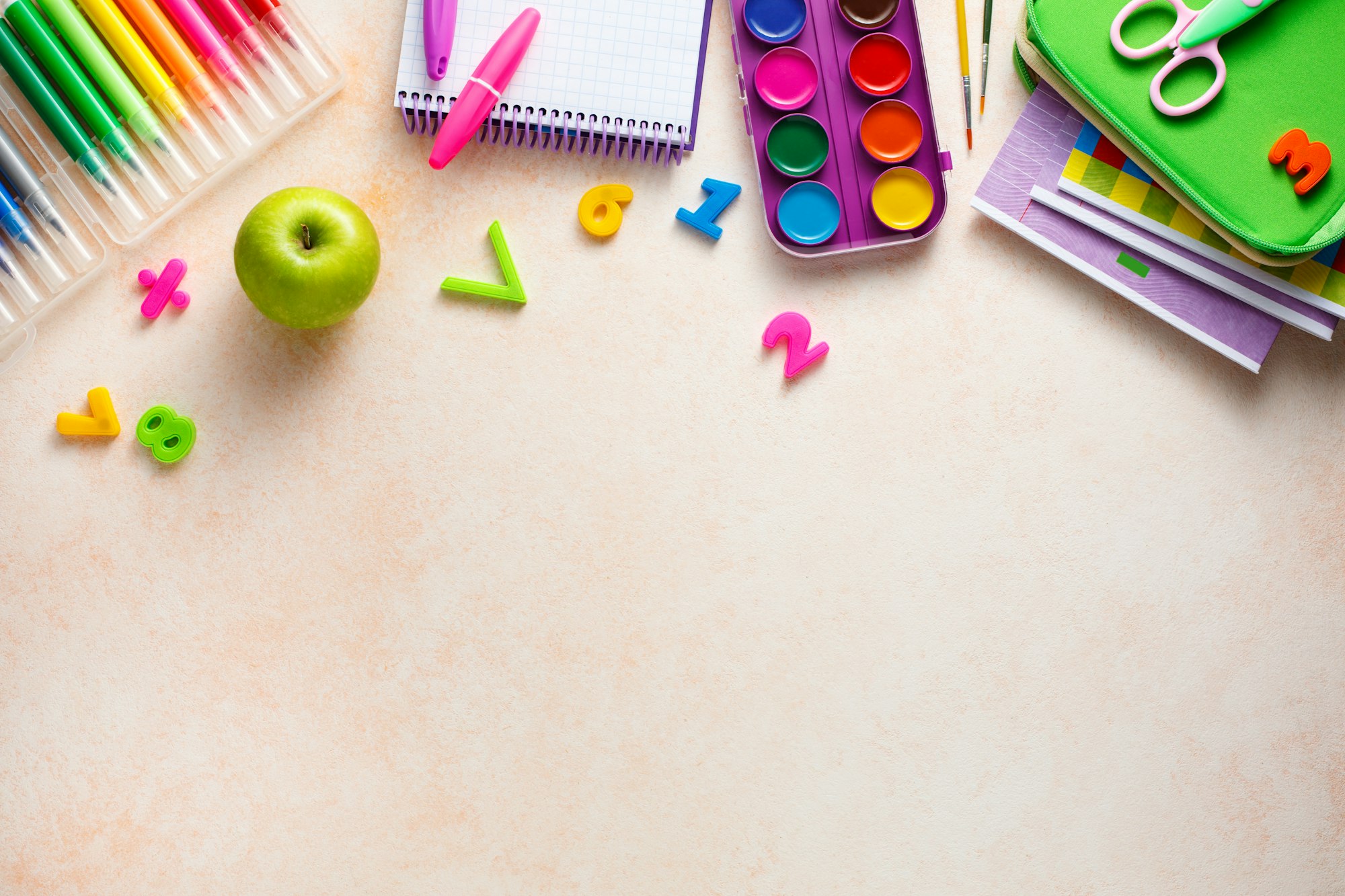 Back to school. Different stationery on table